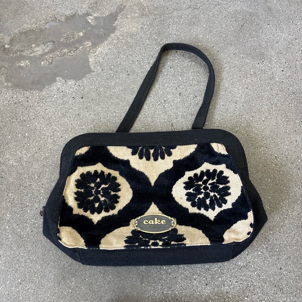 Cake Black and Cream Patterned clutch bag with handle